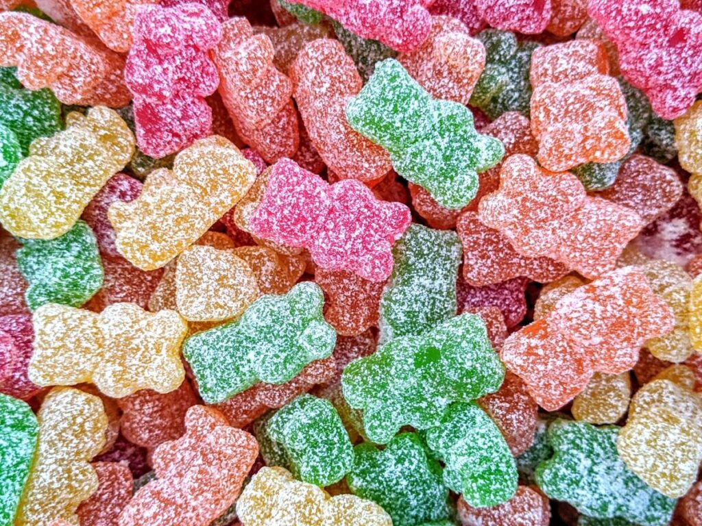 THC infused sour gummy bears in mixed fruit flavors
